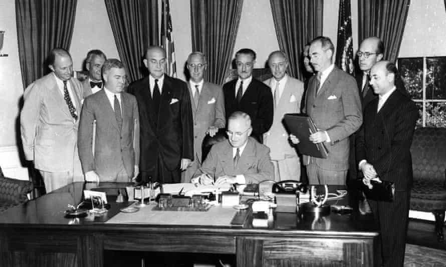 President Harry S Truman signing the North Atlantic treaty, marking the beginning of Nato.