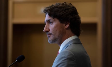 Justin Trudeau listens to a question during a press conference in Ottawa, Canada, on 18 August. 