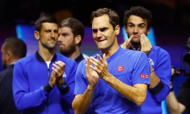 Roger Federer is applauded by his Team Europe colleagues, including Novak Djokovic.