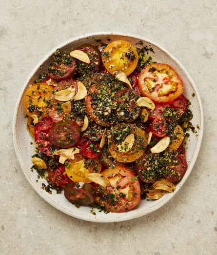 Yotam Ottolenghi’s heirloom tomato salad with black garlic crumb.
