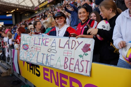 England fans with a banner after the Women’s Rugby World Cup 2025 semi-final victory over France.