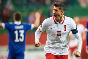 Robert Lewandowski celebrates after scoring the first of his two goals for Poland against Bosnia and Herzegovina