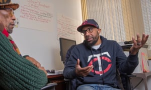 Keith Benson, President of the Camden Education Association speaking with R. Mangaliso Davis, a long time political activist, about air quality in Camden schools.