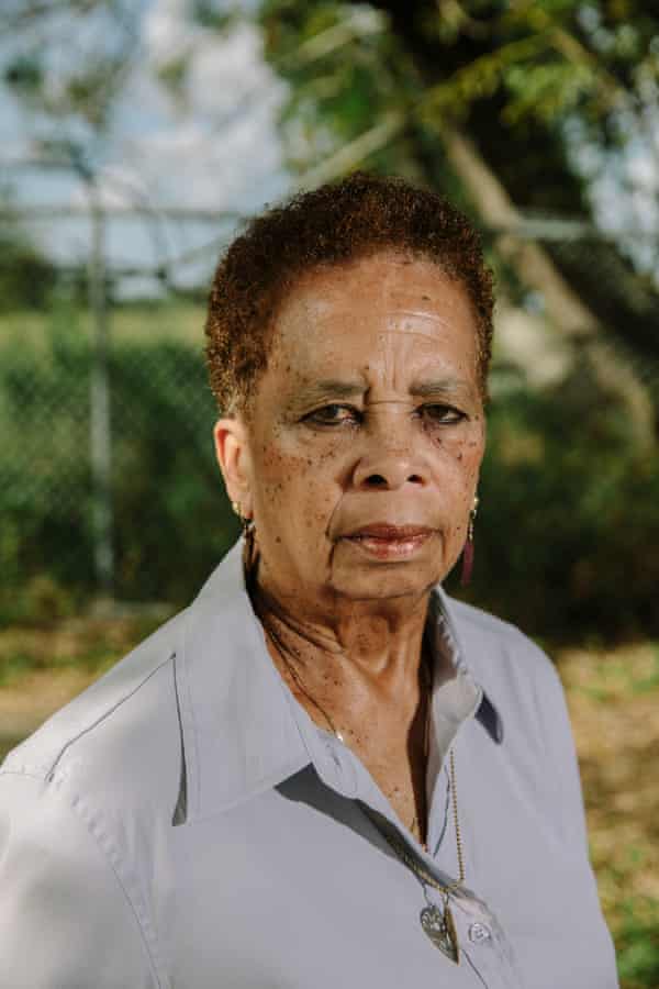 Lydwina Hurst stands across the street from her home in the Gordon Plaza neighborhood, where she has lived since 1989.