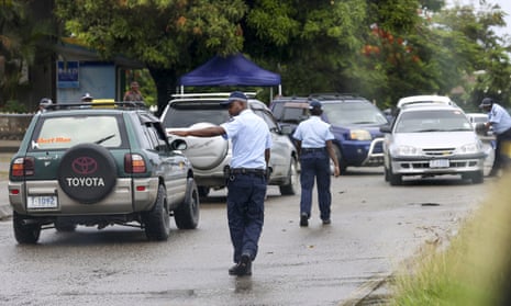 Solomon Islands police and Australian federal police man road blocks in Honiara early this month