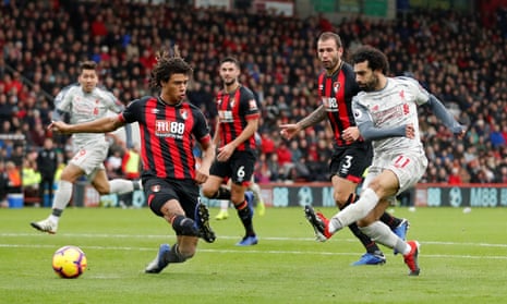 Mohamed Salah scores his side’s second goal against Bournemouth.