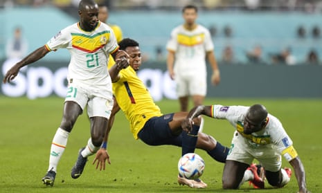 Senegal's Youssouf Sabali, left, and Kalidou Koulibaly, right, during the World Cup group A soccer match against Ecuador.