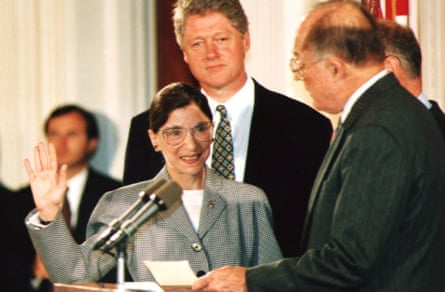 Ruth Bader Ginsburg takes the oath of office to the US supreme court, in 1993 as President Bill Clinton looks on.