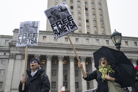 people hold signs that read 'free Rumeysa'