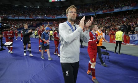 Jürgen Klopp leads his Liverpool players on a lap of appreciation following defeat to Real Madrid in the 2018 Champions League final in Kyiv. They would lose the same game to the same opponents in Paris four years later.