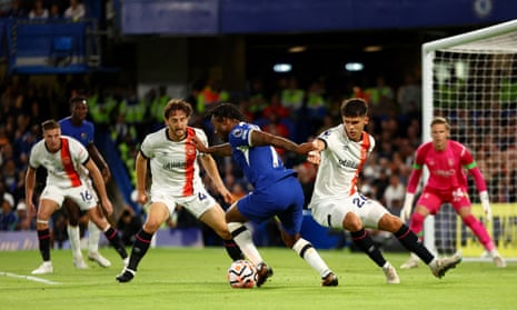 Chelsea v Luton: Premier League – live | Premier League 5 Chelsea's Raheem Sterling in action with Luton Town's Ryan Giles and Tom Lockyer.