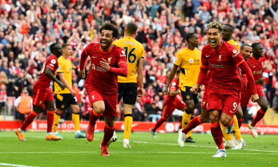 Mohamed Salah celebrates after putting Liverpool 2-1 ahead - moments after Manchester City had taken the lead at the Etihad.