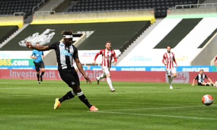 Newcastle’s Allan Saint-Maximin scores his side’s first goal after Enda Stevens failed to clear.