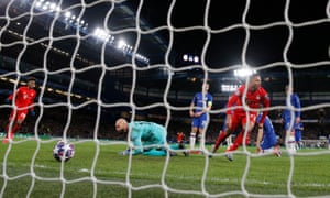 Serge Gnabry of Bayern Munich celebrates after he scores his team's first goal during the UEFA Champions League round of 16 first leg match between Chelsea FC and FC Bayern Muenchen at Stamford Bridge on February 25, 2020 in London, United Kingdom.
