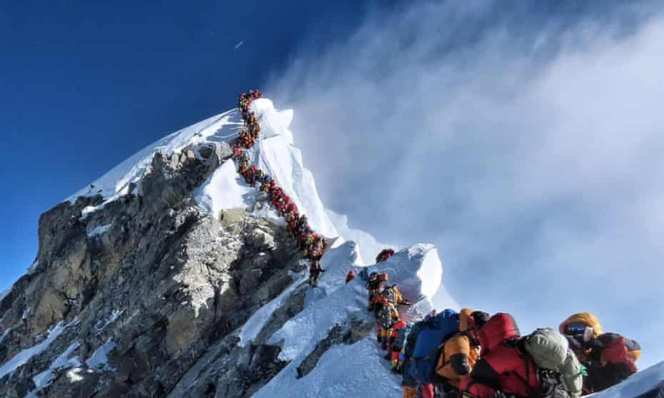 Queue of climbers trying to get to the top of Everest