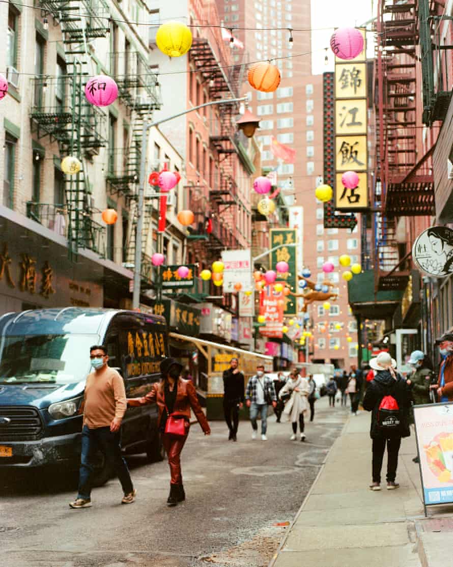 Chinatown street with colorful lanterns in the air
