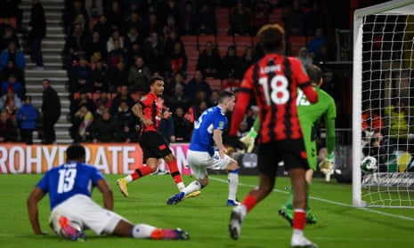 Junior Stanislas of Bournemouth scores his team's second goal against Everton.