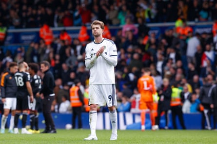Patrick Bamford applauds Leeds fans after the defeat to Fulham.