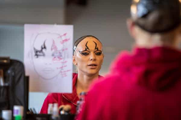 Bimini, one of RuPaul’s Drag Race Drag Queens, looks in a mirror, getting made up for a shoot, March 2021