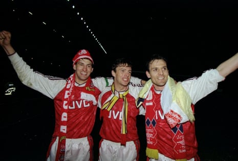 Tony Adams, David O’Leary and Steve Bould, mainstays of the Graham-era defence, strike their usual pose of standing in a line with their arms in the air … but this time they’re not claiming for offside. (They’d just won the 1990-91 title.)