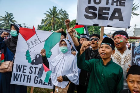 Protesters shout slogans during a rally in solidarity with Palestinian people in Depok, West Java, Indonesia, 06 January 2024.