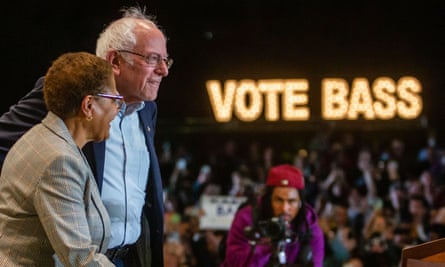 Sanders stands with Representative Karen Bass, the Los Angeles Democratic mayoral candidate, in Playa Vista, California, on 27 October.