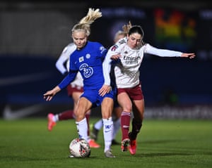 Pernille Harder of Chelsea battles for possession with Leonie Maier of Arsenal.