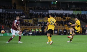 Wolverhampton Wanderers’ Raul Jimenez scores their first goal.