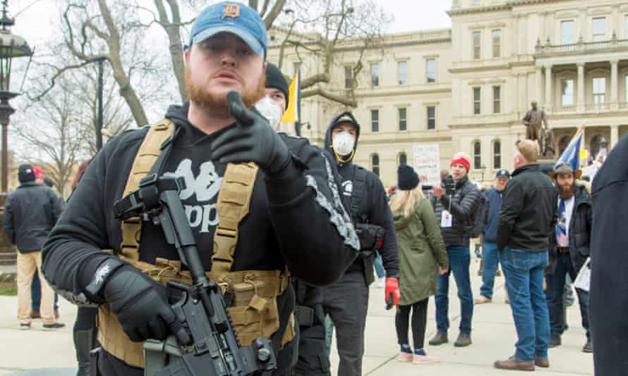 Anti-lockdown protesters carrying firearms in front of the Michigan state Capitol in 2020.