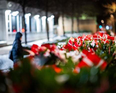 A growing number of Danish flags are placed in front of the US Embassy in Copenhagen, Denmark.