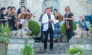 William Christie and musicians in his garden at Thiré in the Vendée.