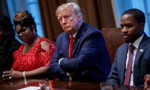 Donald Trump participates in a meeting with African American community, business and faith leaders in the Cabinet Room on 27 February.