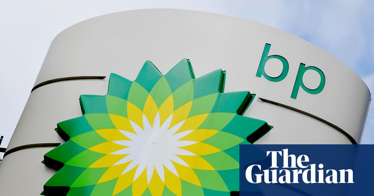 BP halts share buy-backs as annual profits slide