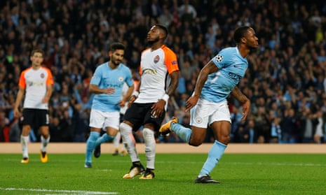 Raheem Sterling celebrates scoring their second to seal the win.
