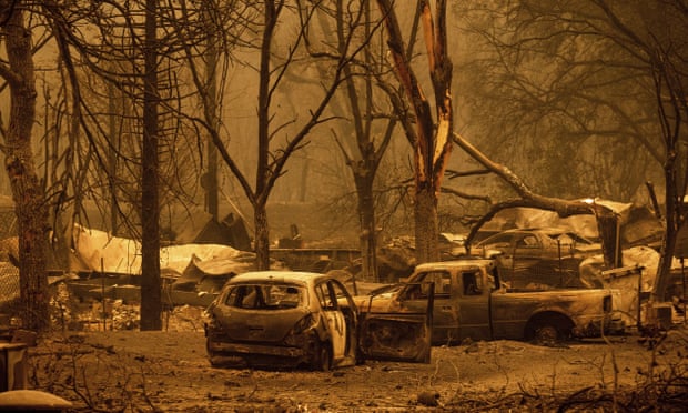 Scorched vehicles and residences line the Oaks Mobile Home park in the Klamath River community.