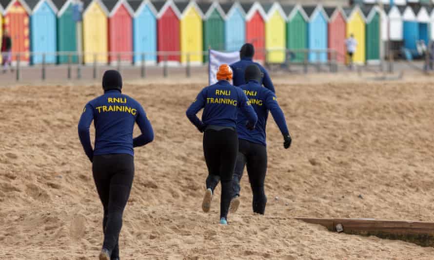 RNLI lifeguards in training on Boscombe beach