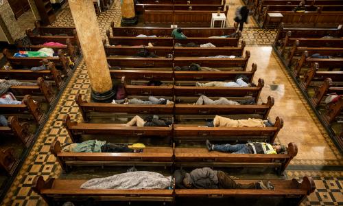 Homeless people sleep in the pews at St Boniface Catholic Church in the San Francisco Tenderloin area, as part of the Gubbio Project. 