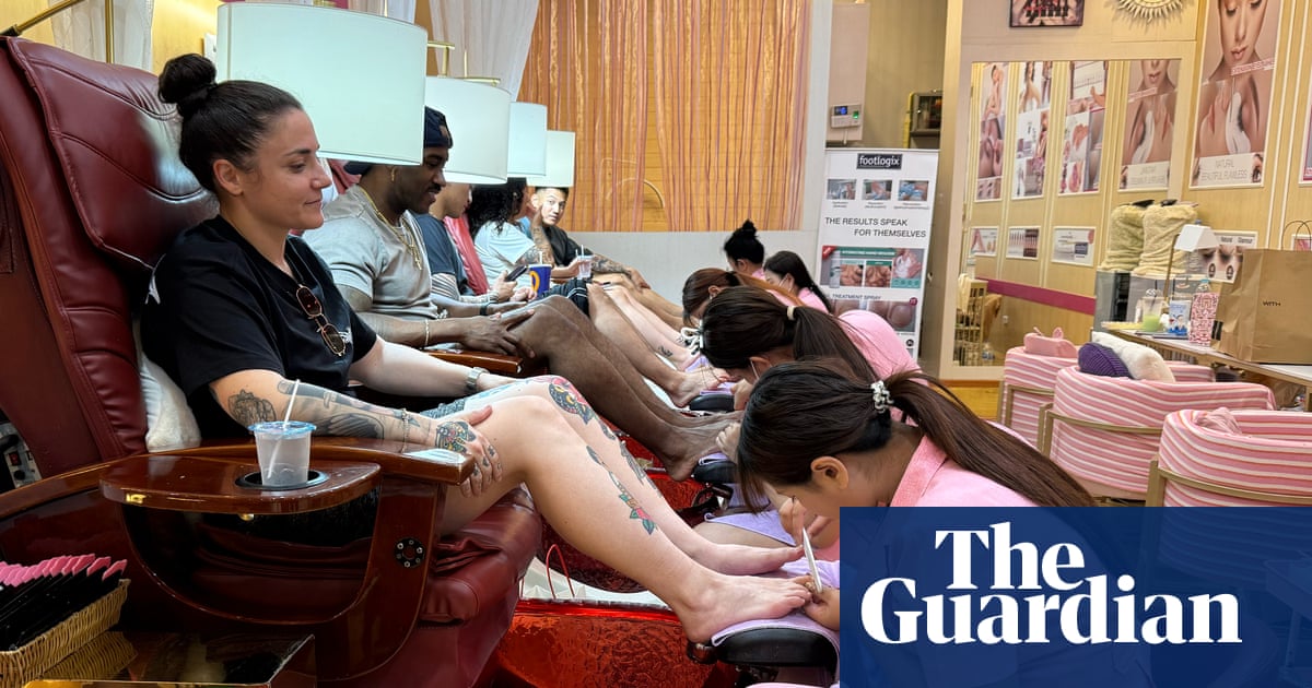 Pedicures and a pair of socks: sailors from USS Abraham Lincoln go wild in party resort of Pattaya