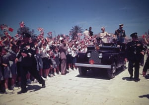 Malta, 1954: crowds waving union flags greet the royals during a visit to the island, as part of Queen Elizabeth’s first Commonwealth tour
