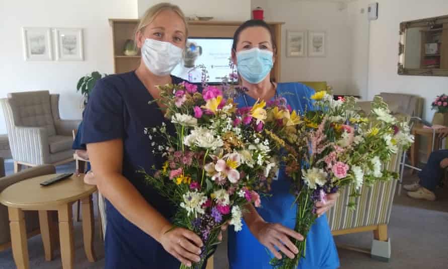 Staff at the Madeline McKenna Court care home receive Wonky Garden bouquets.