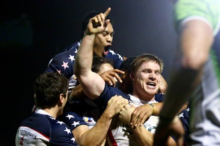 Mark Offerdahl celebrates after scoring a try for USA against Cook Islands in the 2013 Rugby League World Cup.