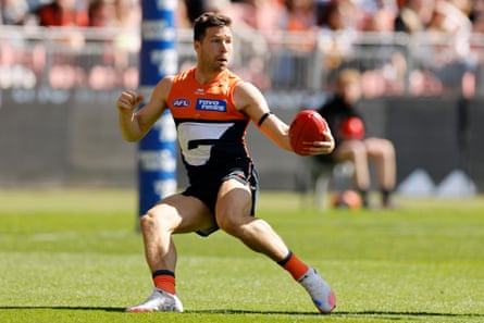 Toby Greene runs with the ball for GWS Giants
