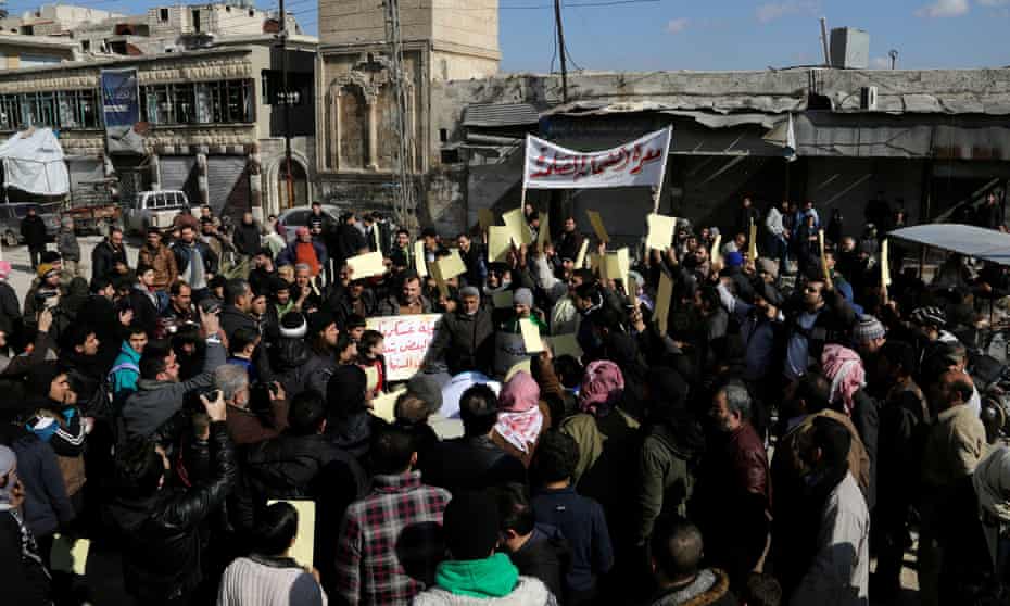 Syrians demonstrate against the regime’s foreign supporters in Idlib.