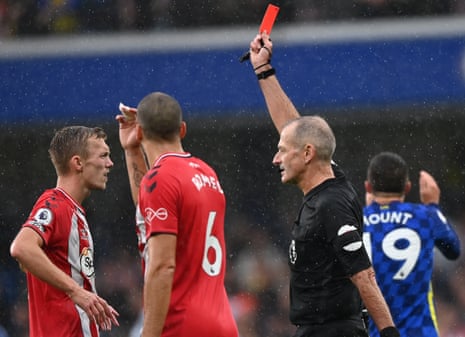 Martin Atkinson shows a red card to Ward-Prowse.