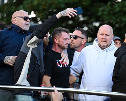Tommy Robinson, whose real name is Stephen Yaxley-Lennon, with protesters at Southampton Central police station, 2 June 2026.