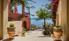 hotel grounds with flowers and sea view