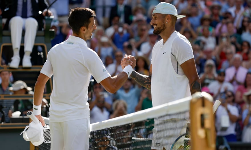 Nick Kyrgios congratulates Novak Djokovic at the conclusion of the final.