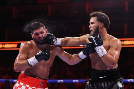 Filip Hrgovic head is knocked back by a right hand from Moses Itauma