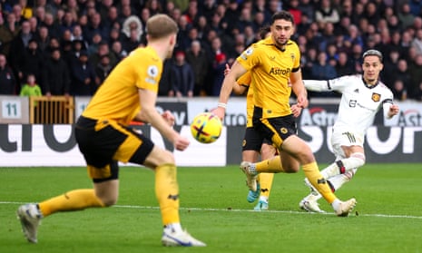 Antony of Manchester United has a shot on goal whilst under pressure.