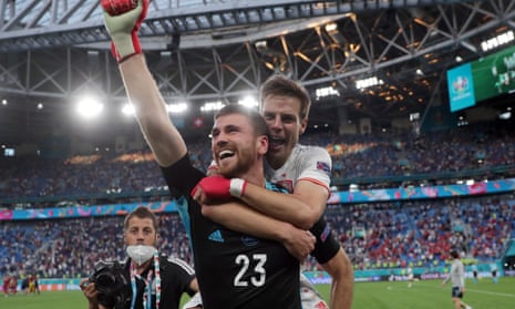 Unai Simon and César Azpilicueta celebrate after Spain beat Switzerland on penalties to reach the Euro 2020 semi-final.